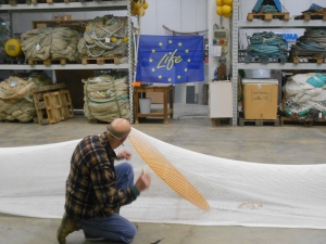 Installation of the TED grid on a bottom trawl net